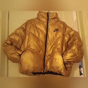 Nike women's gold parka in size medium